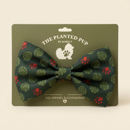 large green bowtie with monstera leaves and paw logo